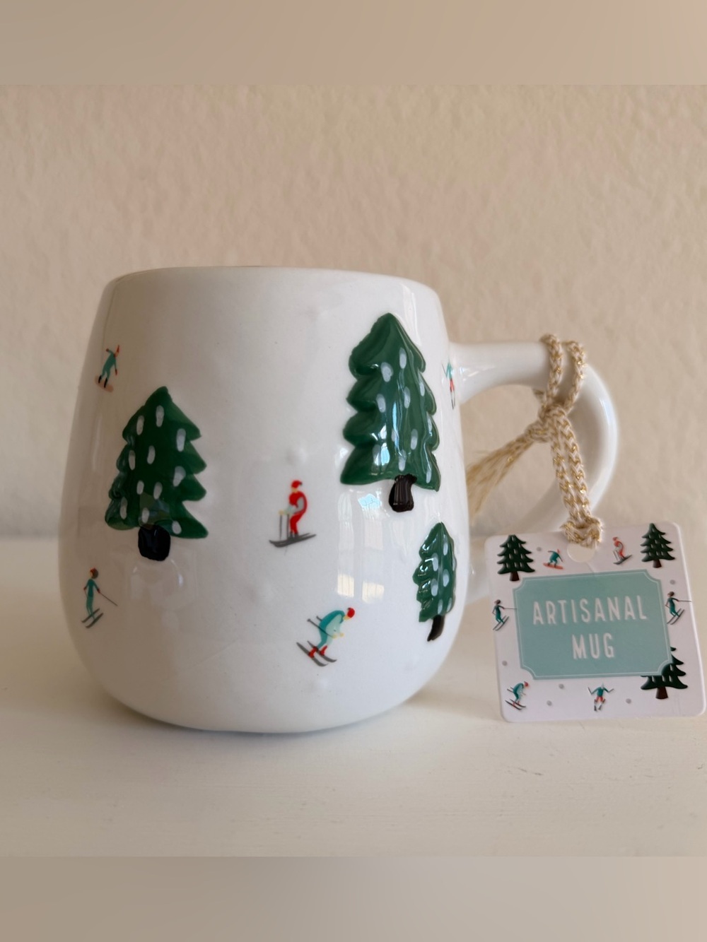Artisan White Ceramic Mug with Green Pine Tree and Ski Motif